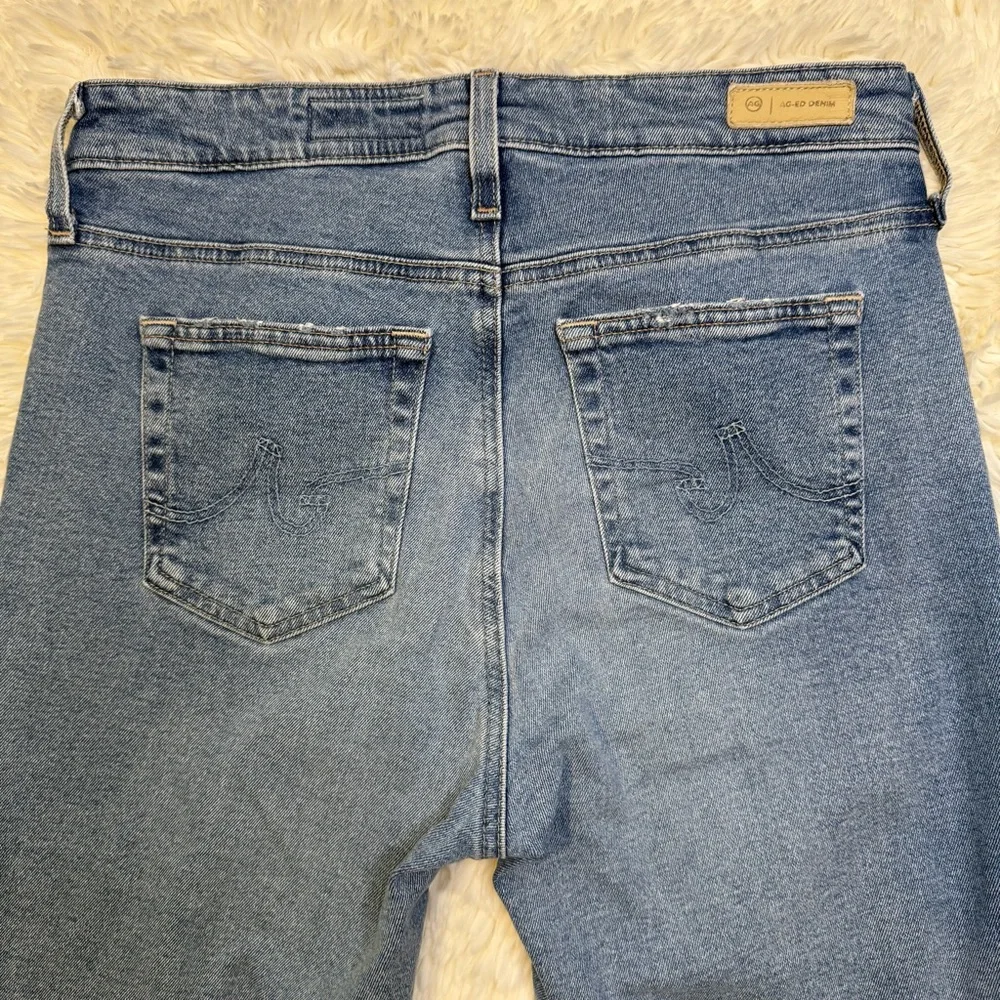 AG Adriano Goldschmied Light Wash Bootcut Jeans w/ Raw Hem